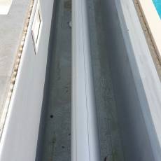 Remplacement d&#039;un tablier de volet et fixations sur piscine 14m x 7m