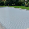 Remplacement d&#039;un tablier de volet et fixations sur piscine 14m x 7m